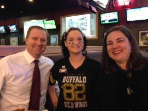Senators Eric Schmitt, R-15, and Jolie Justus, D-10, right, during their outing to Buffalo Wild Wings with Nancy Giddens two weeks ago. (Submitted photo)