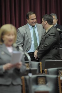 Diehl talks with House members on the floor earlier during session.