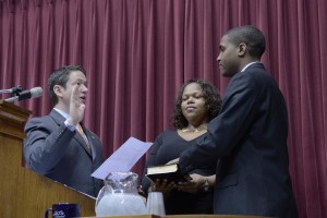 Rep. Josh Peters, D-St. Louis, gets sworn-in by House Speaker Tim Jones Wednesday morning. 