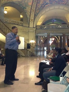 Rep. Steve Webb talks with the crowd gathered in the Capitol rotunda Monday.