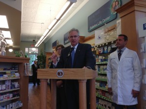 Gov. Jay Nixon speaks to the crowd gathered at Greentree Pharmacy in Kirkwood, Mo., Monday afternoon. (photo by Ashley Jost)