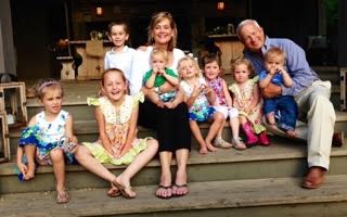 Brunner with wife and grandchildren. The couple have 3 children and 9 grandchildren - a tenth on the way in the fall