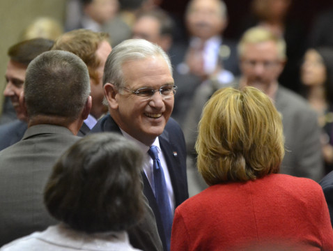 Gov. Jay Nixon greets representatives as he enters the House chamber for his final State of the State speech, Jan. 20, 2016. (Travis Zimpfer/Missouri Times)