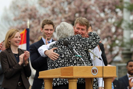 Attorney General Chris Koster and Sen. Gina Walsh embrace after Walsh introduced Koster at a union rally in Jefferson City, Mo. March 30, 2016. (Travis Zimpfer/Missouri Times)