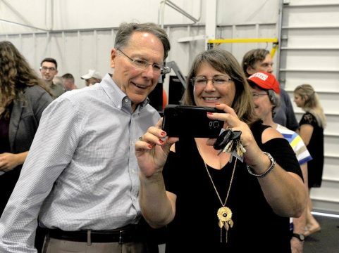 Cheri Toalson Reisch poses for a picture with the NRA's Wayne LaPierre at an event in Columbia August 11. (Courtesy of Cheri Toalson Reisch Facebook Page)