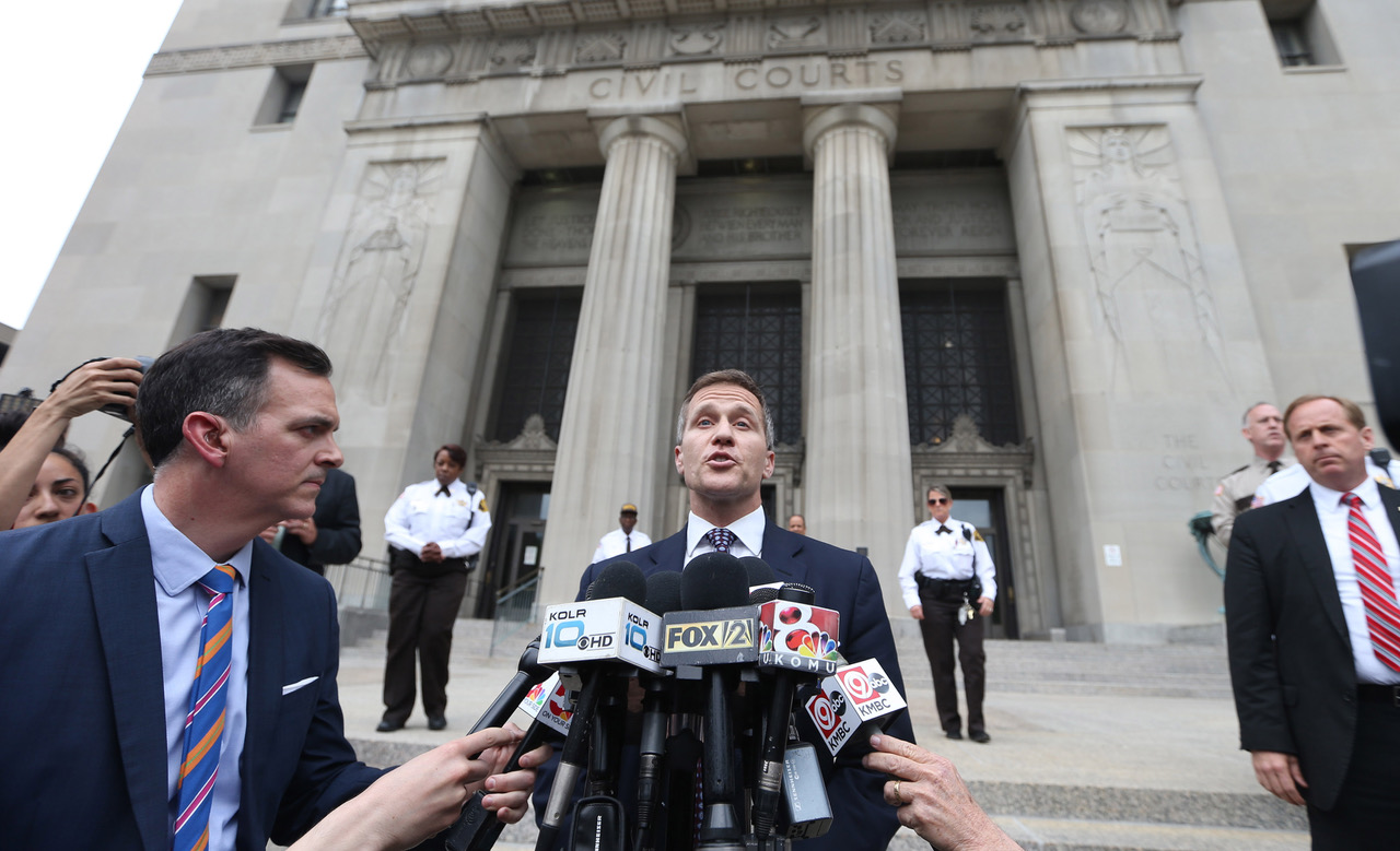 Missouri Governor Eric Greitens talks to reporters outside the Civil Courts Building after charges of invasion of privacy against the Governor were dropped in St. Louis on May 14, 2018. Prosecutors said that Greitens had taken an explicit photo of a woman with whom he was having an affair, without her consent. Greitens proclaimed his innocence of taking a photo but did admit to having the affair. Photo by Bill Greenblatt/UPI