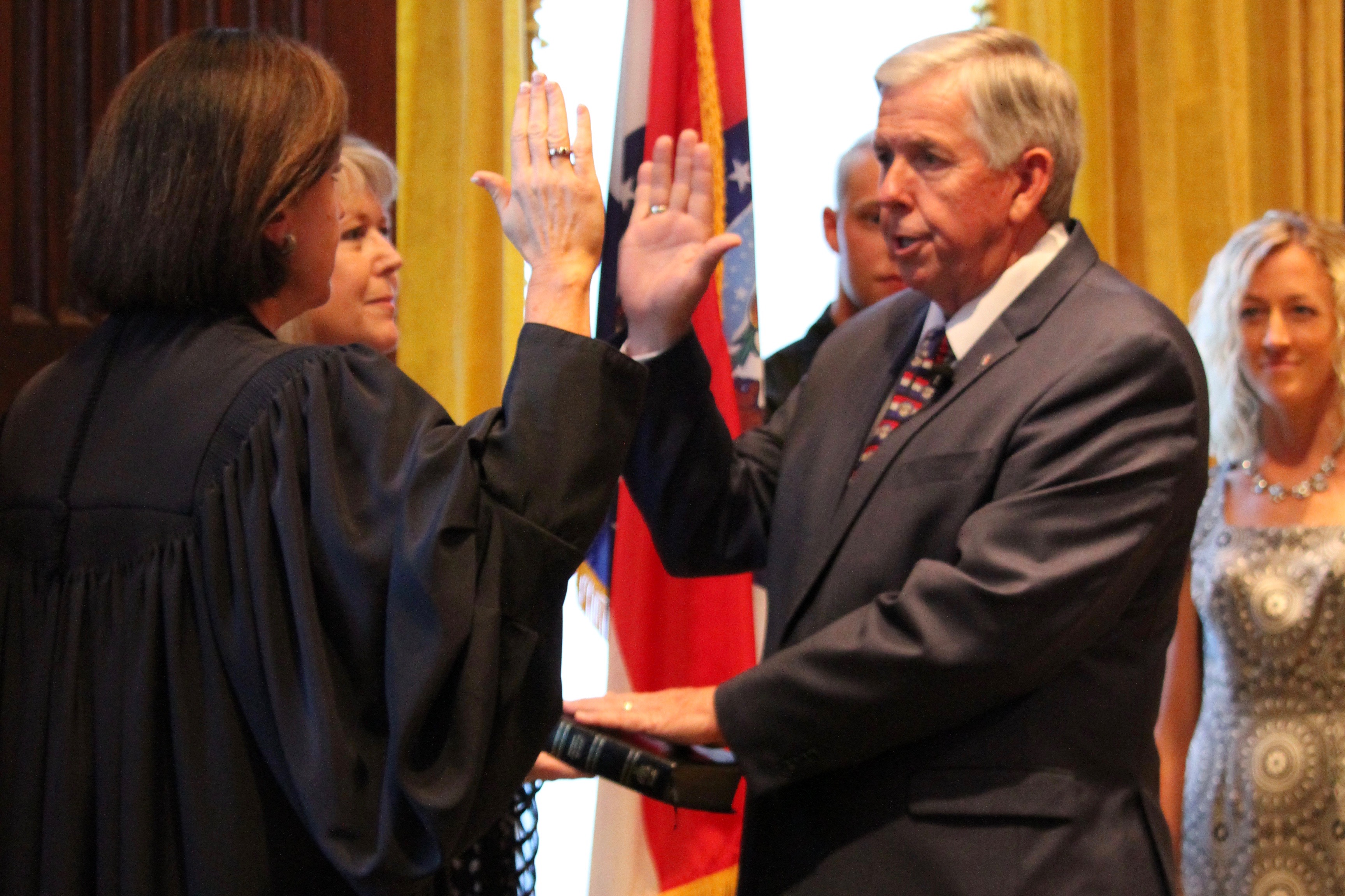 Mike Parson is sworn in by Supreme Court Judge Mary Russell as Missouri's 57th governor. (ALISHA SHURR/THE MISSOURI TIMES)