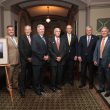 Former presidents pro tem and the governor joined Sen. Richard at the unveiling of his portrait. From left to right: Tom Dempsey, Charlie Shields, Gov. Mike Parson, James L. Mathewson, Mike Gibbons, Sen. Ron Richard and Rob Mayer.