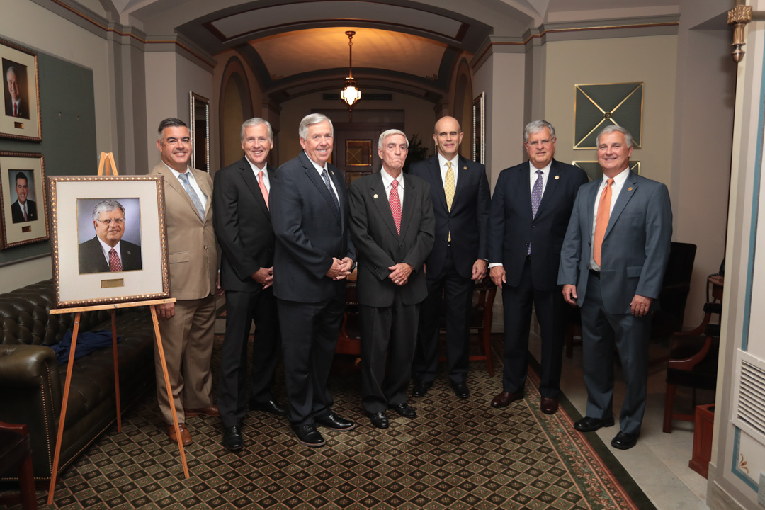 Former presidents pro tem and the governor joined Sen. Richard at the unveiling of his portrait. From left to right: Tom Dempsey, Charlie Shields, Gov. Mike Parson, James L. Mathewson, Mike Gibbons, Sen. Ron Richard and Rob Mayer.