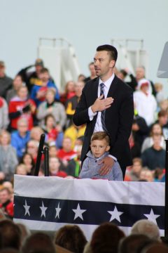 Boone County Clerk Taylor Burks with his son at a rally for U.S. Senate Josh Hawley in Columbia (ALISHA SHURR/THE MISSOURI TIMES.)